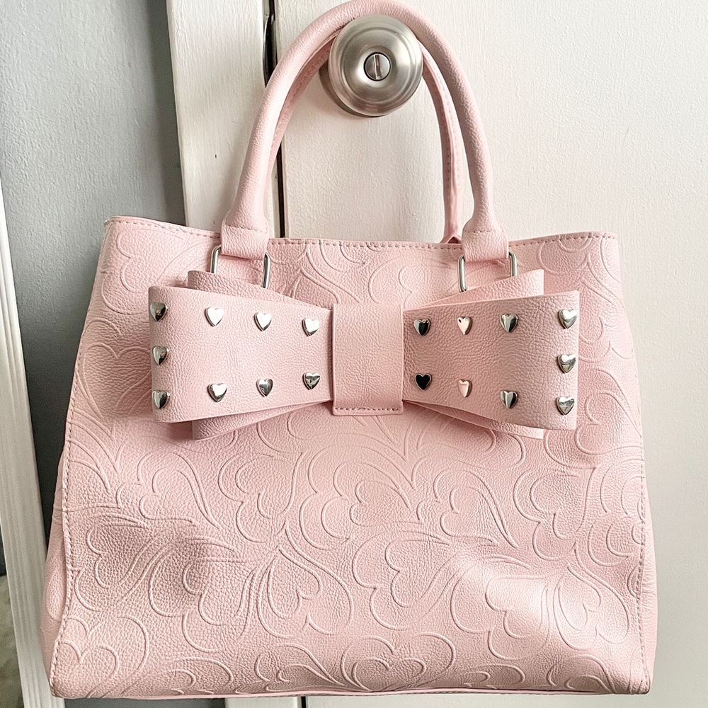 Betsy Johnson large faux leather studded bow pink